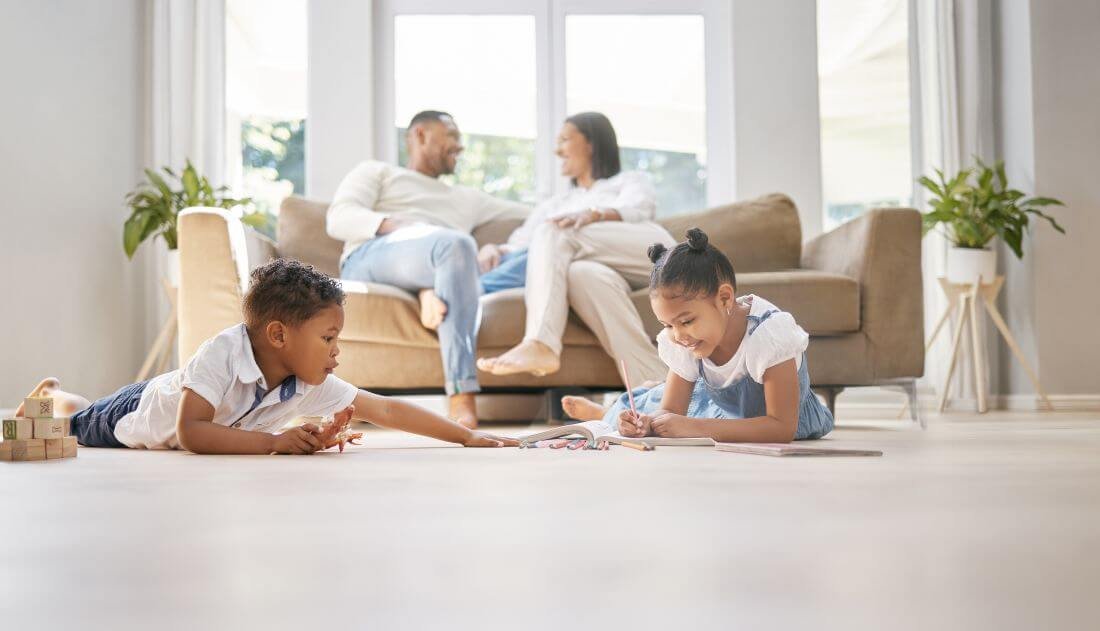 Happy family enjoying clean home thanks to Essential Cleaning NJ services