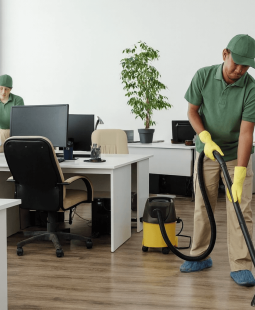 Essential Cleaning Essex County professional office cleaning team vacuuming workspace